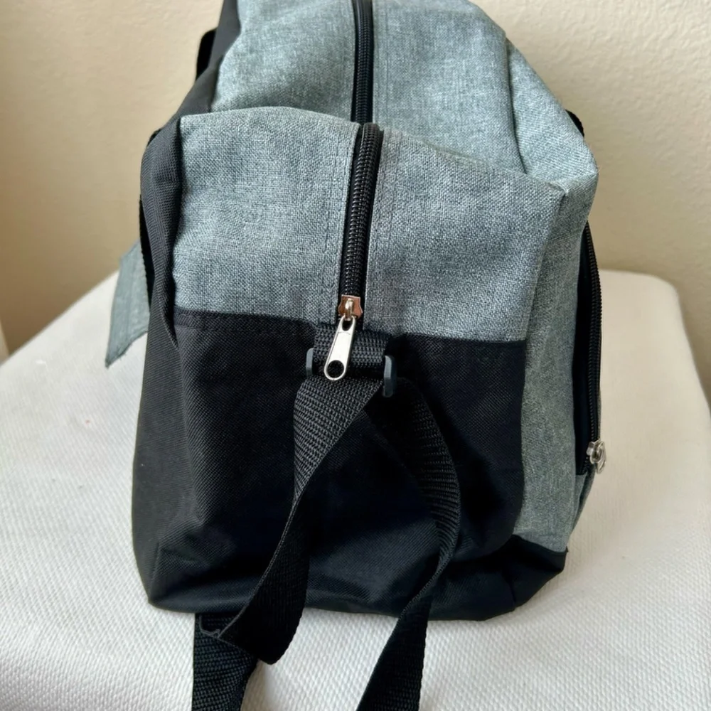 Duke Duffle Bag Gray Black Handles Front zipper pocket side mesh pocket FOREVER